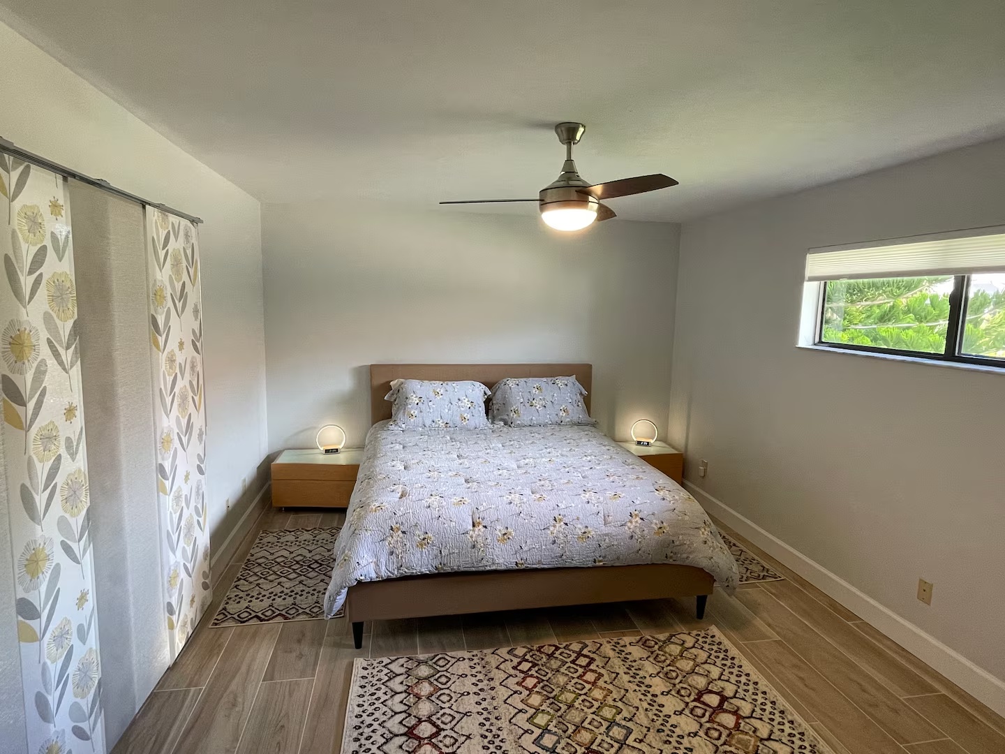 Primary bedroom with neutral decor